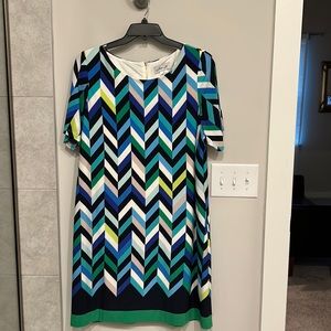 Pretty dress for office. Fits great for curvy gals. Lovely colors.
